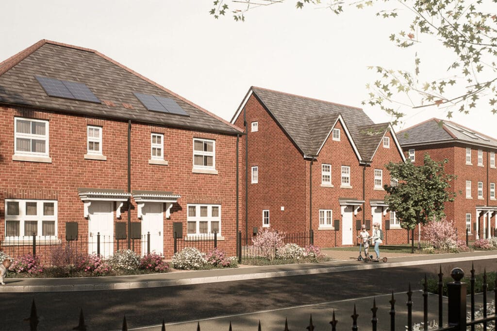 A wider street scene at The Furlongs, Holland Park, featuring a mix of detached and semi-detached red-brick homes with solar panels, planting, and tree-lined pavements — capturing the calm character of this new Broadgate neighbourhood.