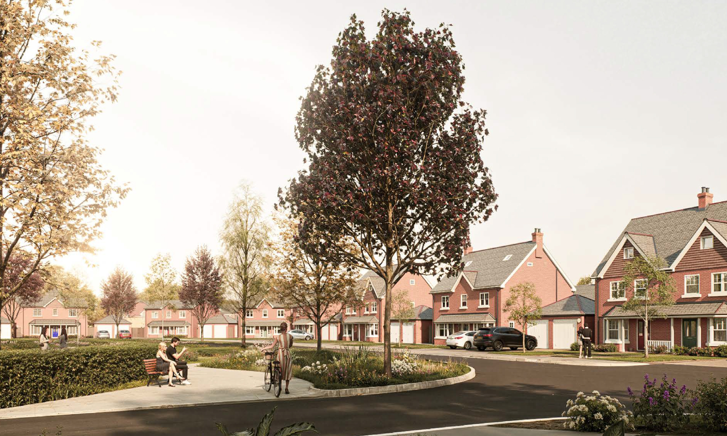 A landscaped street scene at Gleneagles Drive with red-brick family homes, mature trees and planting, and residents relaxing and walking through the central green space – capturing the calm, community-focused character of the development.