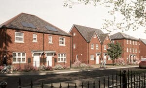 A wider street scene at The Furlongs, Holland Park, featuring a mix of detached and semi-detached red-brick homes with solar panels, planting, and tree-lined pavements — capturing the calm character of this new Broadgate neighbourhood.